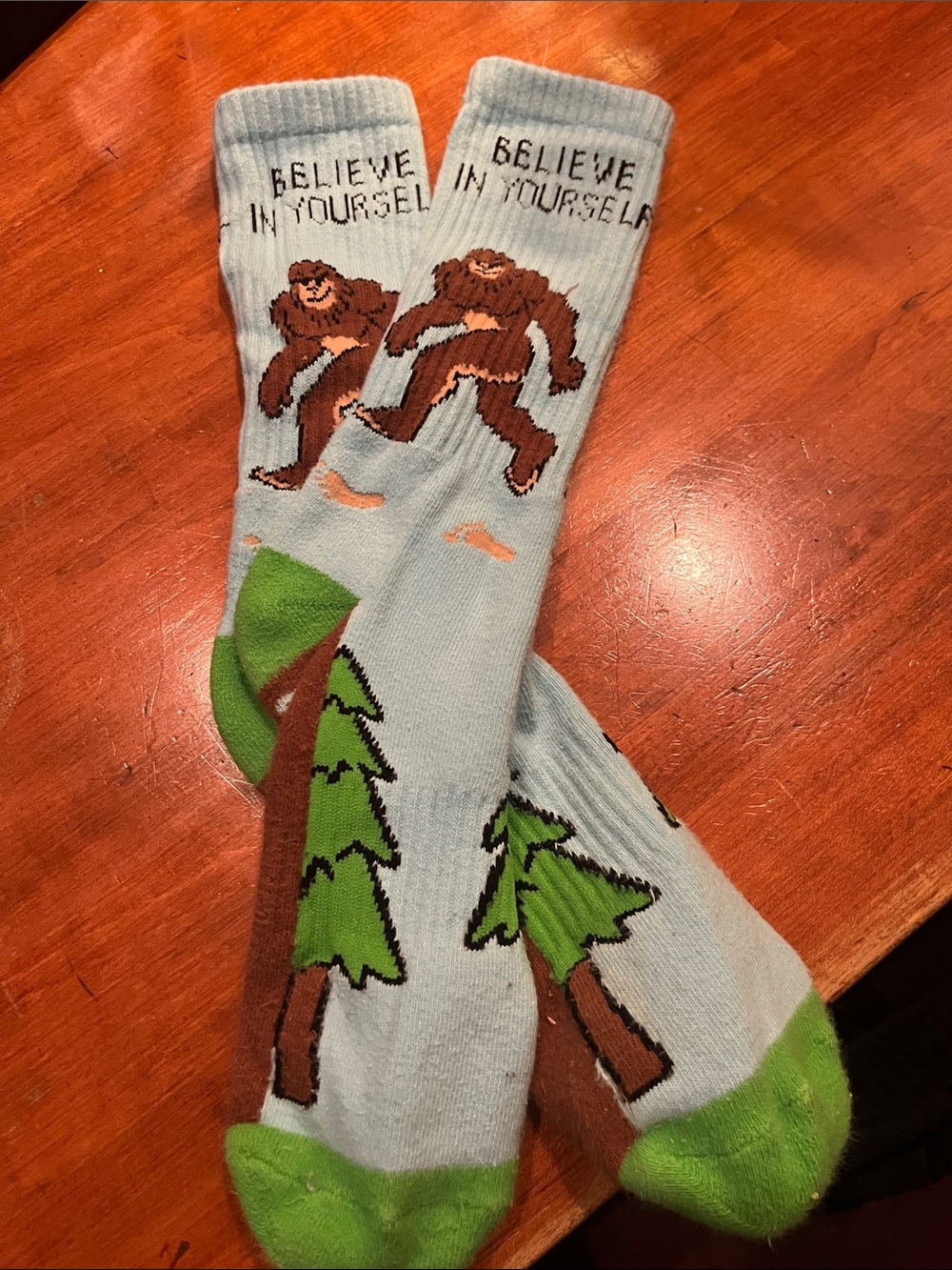 Believe In Yourself Bigfoot Novelty Crew Socks - Light Blue & Green